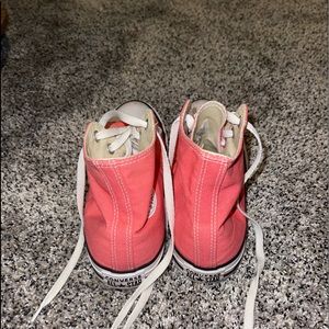 Women’s coral high top converse